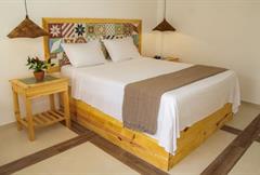 Quarto Confort com varanda e jardim