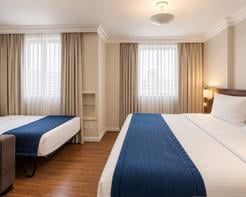 Luxo Triplo - 1 Cama Queen Size e 1 Cama de Solteiro Extra