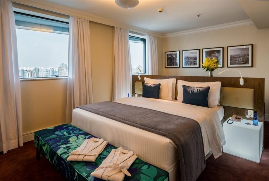 06 suíte executiva - cama king size2.jpg