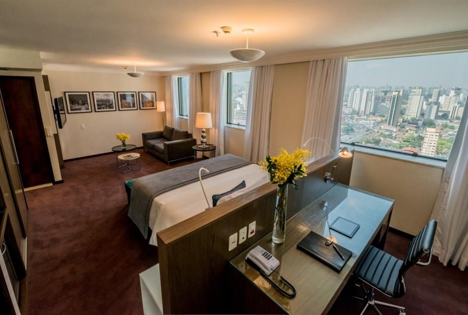 05 suíte executiva - cama king size1.jpg