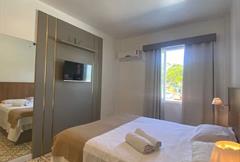 Quarto Frente Mar Luxo