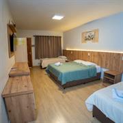 SUITE PREMIUM QUÁDRUPLA CENTRAL TERREO
