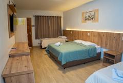 SUITE PREMIUM QUÁDRUPLA CENTRAL TERREO