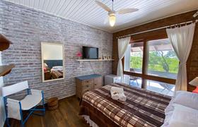Quarto Triplo do Pousada Morada das Bromélias