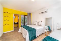 Suíte Premium Quádruplo Vista Rio