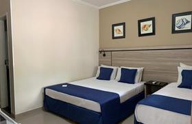 Superior Triplo Casal do Summit Beach Hotel Boiçucanga