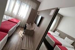 Quarto Standard Triplo Twin