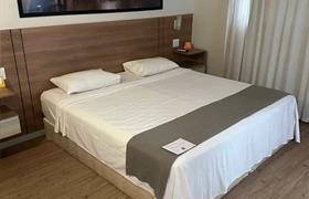 Standard king PNE do Hotel Amsterdam Montes Claros