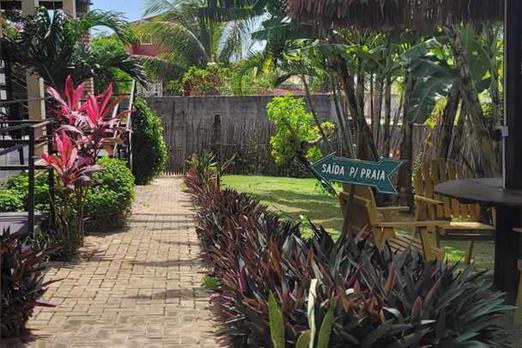 nosso jardim e saida para praia.jpg