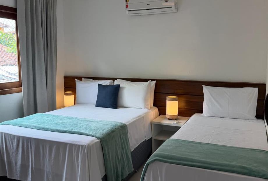 quarto - apto luxo.jpeg