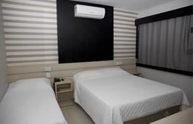 Quarto Triplo Casal + Solteiro do Mogano Express Hotel