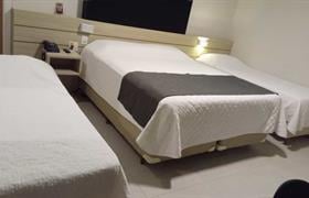 Quarto Triplo Solteiro do Mogano Express Hotel