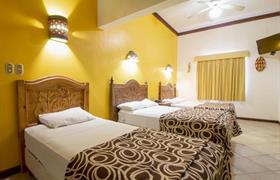 Triple Room of Hotel Suites Flamboyanes by Kavia