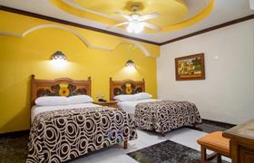 Double Room with Two Double Beds of Hotel Suites Flamboyanes by Kavia