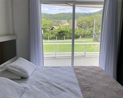 Suíte com cama King-size e Varanda