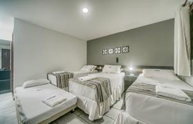 Quarto Quadruplo do Hotel Pousada Da Sereia