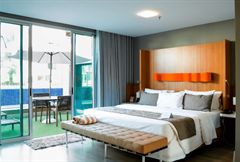 Suíte com cama King Size e varanda