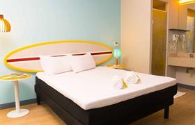 STANDARD QUEEN do Golden Tulip Guarujá (Antigo Delphin Surf Hotel)