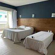 Quarto Triplo Deluxe com Varanda