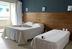 Quarto Triplo Deluxe com Varanda