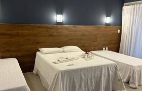 Quarto Quadruplo Deluxe com Varanda do Hotel Paraiso Tropical