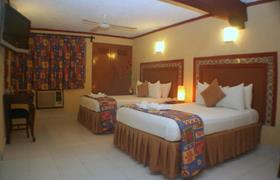 Twin Room of Suites Cancun Center by Kavia