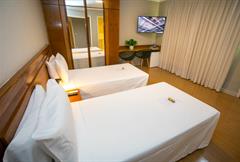 Luxo com 2 Camas de Solteiro