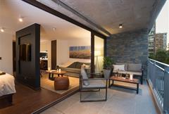Open suite con terraza