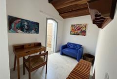 Quarto duplo com escritorio