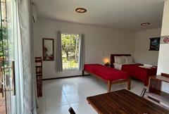 Suíte com Vista para a Piscina