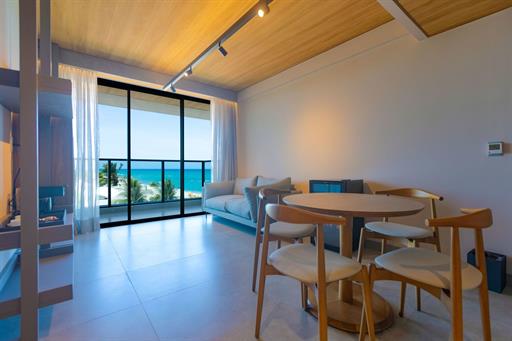 suíte master lateral mar 2 omnibees.jpg