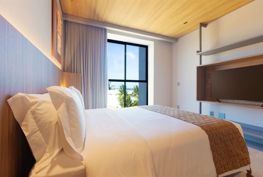 suíte lateral mar 2 omnibees.jpg