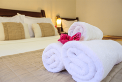 Quádrupla com varanda privativa