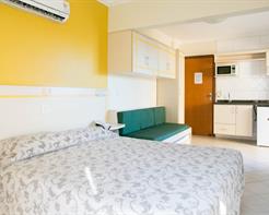 Suíte Família com cozinha e varanda