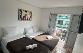 Triplo com Varanda do Pousada Porto Navegantes