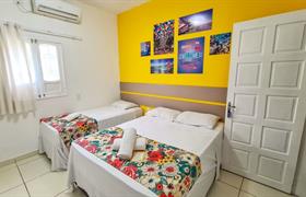 Quarto Quadruplo - CAMA CASAL + AUXILIAR + CAMA SOLTEIRO do Pousada Summer Beach By AFT