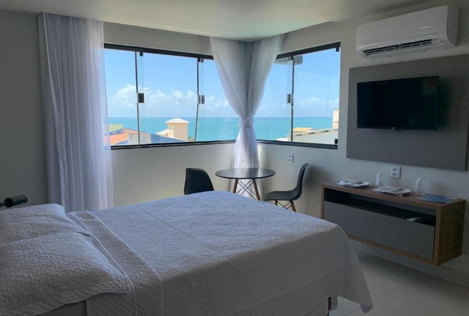 Quarto Triplo Standard com Vista do Mar-1.jpg