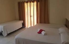 Quarto Quádruplo Standard com Varanda do Pousada Aguas Do Pirui
