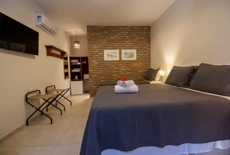 Quarto Triplo Standard com Vista do Jardim-1.jpg