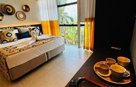 Suíte Vista Mar Deluxe Triplo do Pousada de Charme Refúgio da Villa