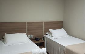 Executive duplo solteiro do Maximus Business Hotel