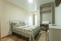 Suíte Standard Flores com Sacada