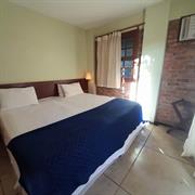 Quarto Standard com Cama de Casal ou 2 de Solteiro e Vista do Jardim