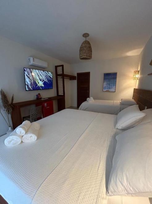 Quarto Triplo com Vista do Mar-2.jpg