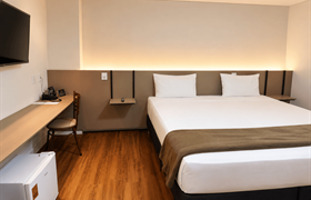 pareja superior de Hotel Greenville by Slim Hotéis