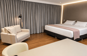 Suíte do Hotel Greenville by Slim Hotéis