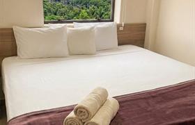 Quarto Deluxe com Cama King-size do Hotel Internacional Guarulhos