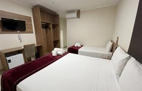 Quarto Casal Cama King-size com Cama Extra do Hotel Internacional Guarulhos