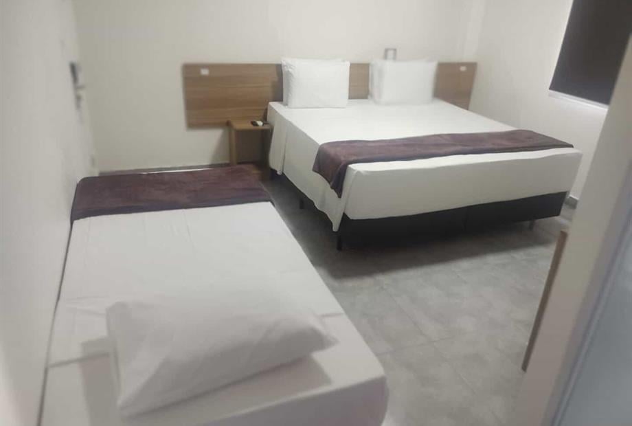 quarto duplo cama extra.jpeg