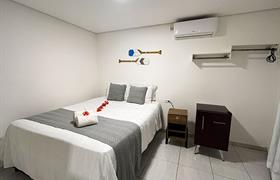 Quarto Duplo Econômico do POUSADA UNAÍ - CASA FLOR